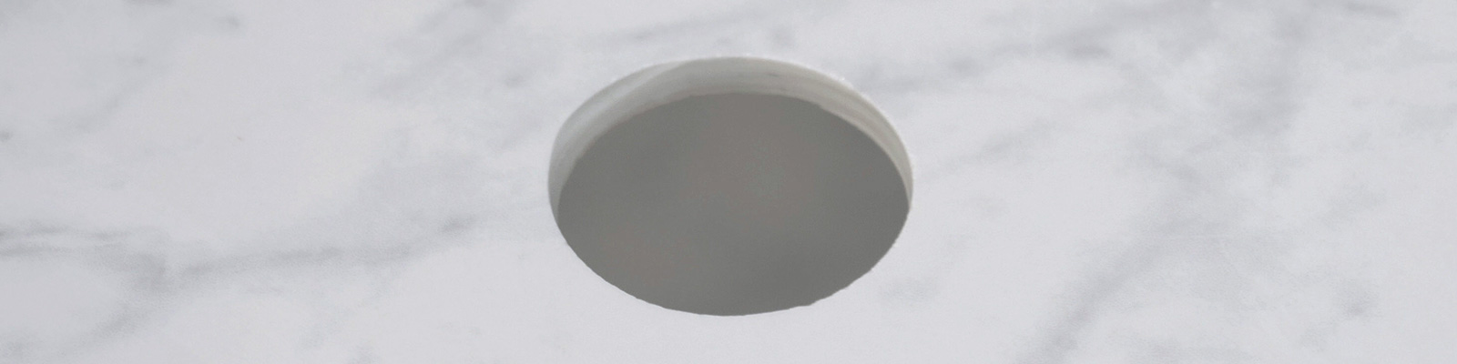 Cutting holes in porcelain tiles