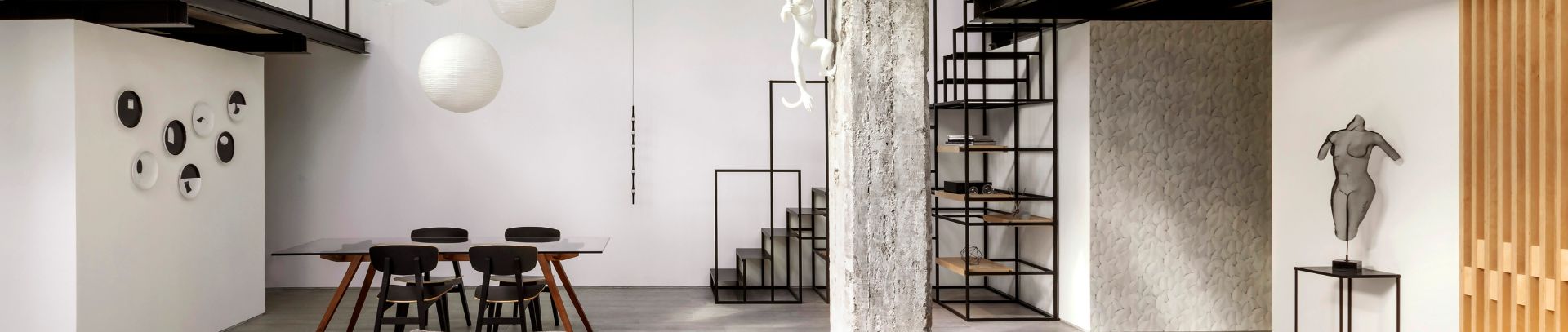 Modern black and white loft apartment tiled with porcelain stoneware