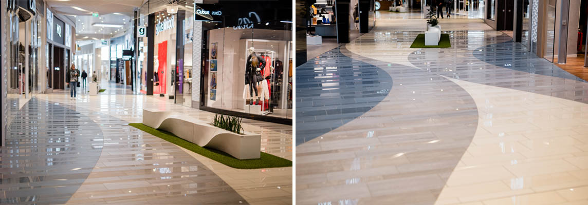 A colourful marble-effect stoneware carpet: Hallarna shopping centre
